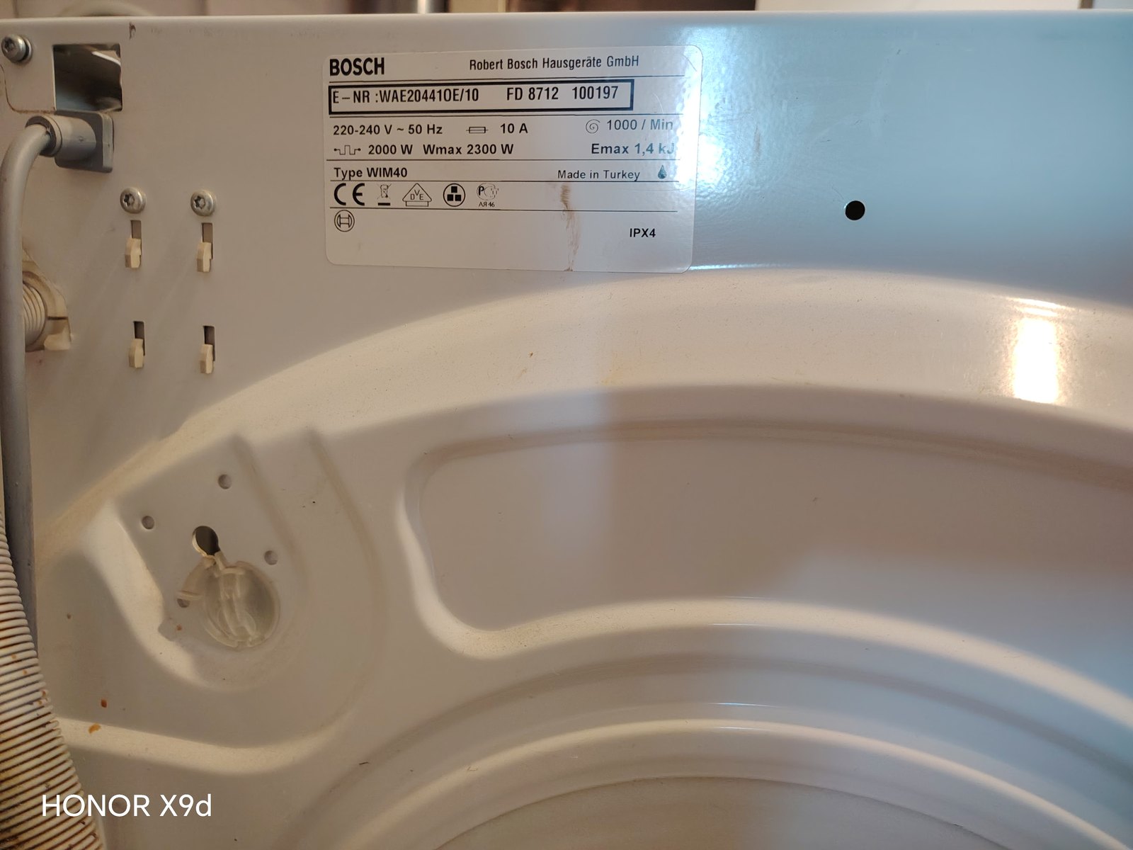 Шильдик стиральной машины Bosch с номером E-Nr WAE204410E/10